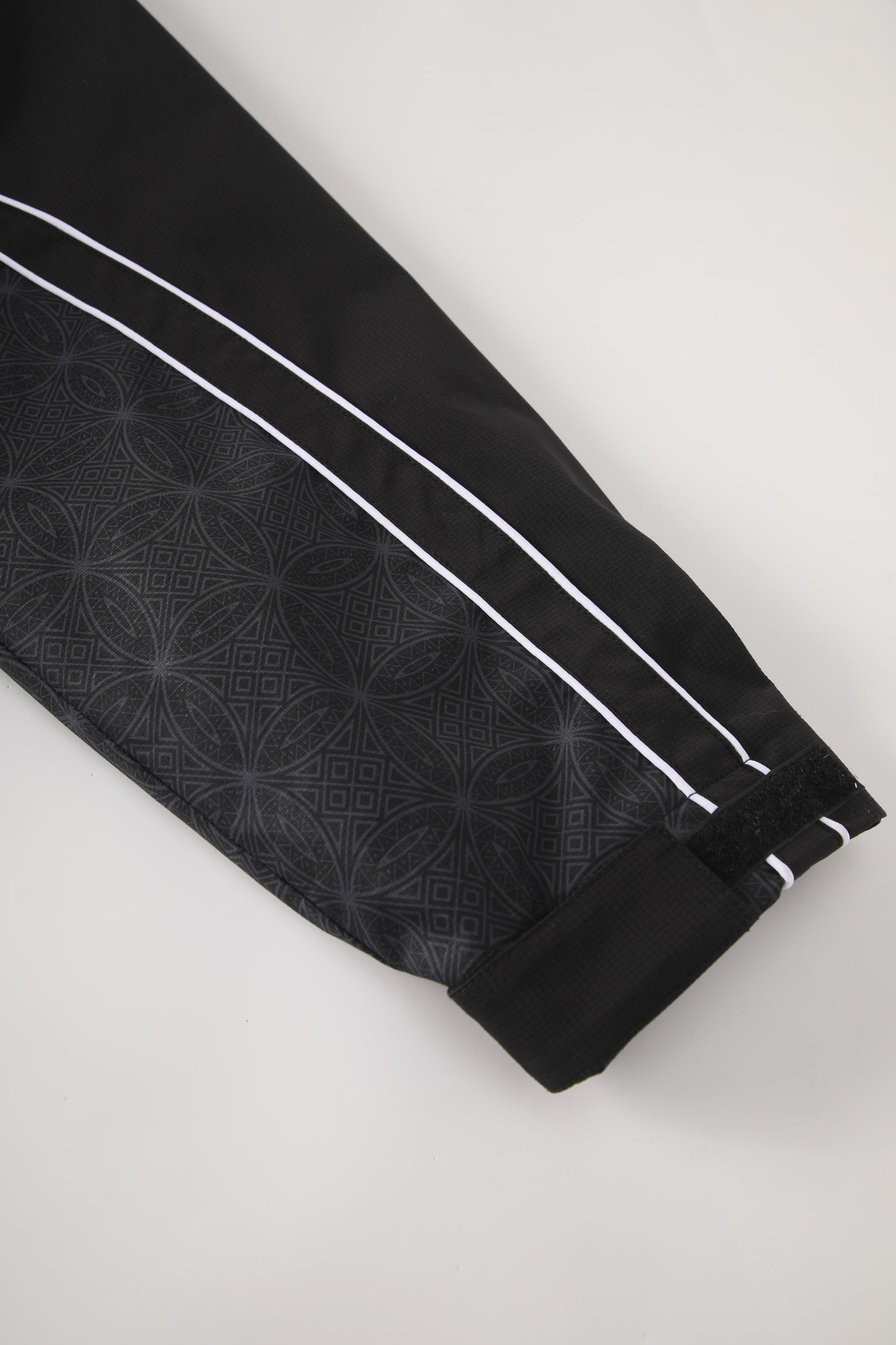 ARABIC WATERPROOF SHELL JACKET